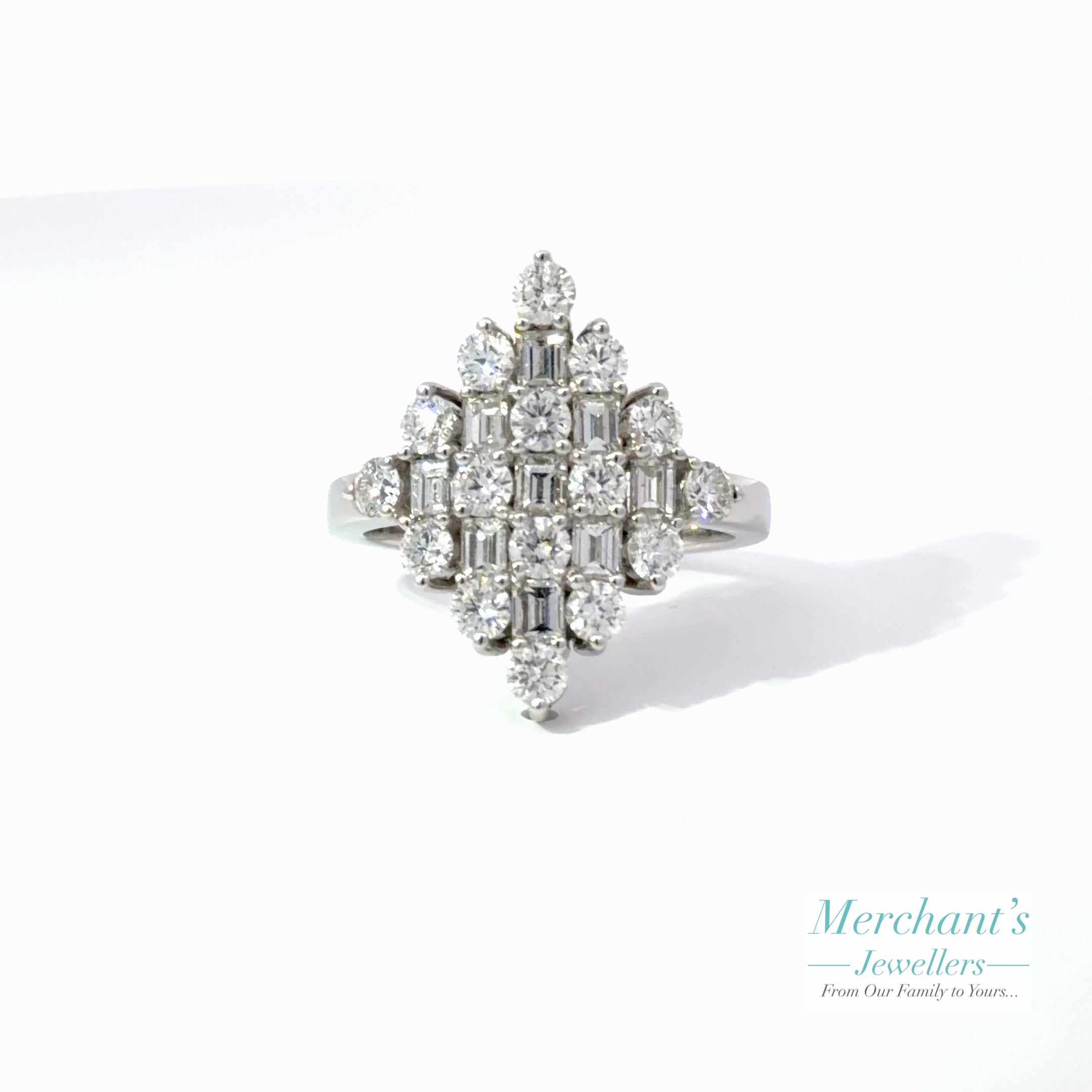 Diamond ring with a white background and 'Merchant's Jewellers' branding.