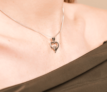 Load image into Gallery viewer, Clogau® Paw Prints Sterling Silver Heart Pendant with Topaz
