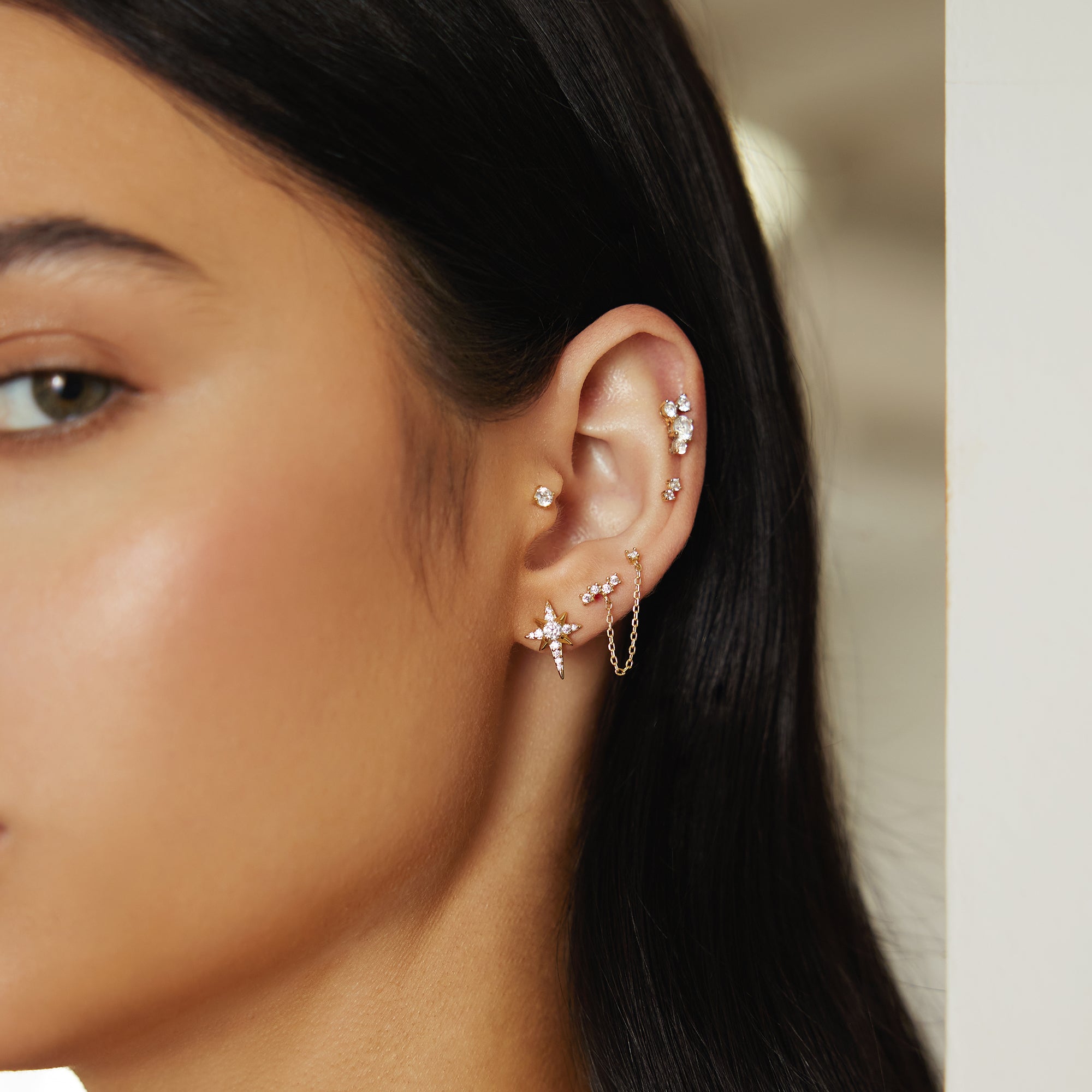GOLD EIGHT-POINTED STAR STUD EARRINGS