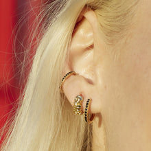 Load image into Gallery viewer, Gold Large Huggie Earrings with Black Stones
